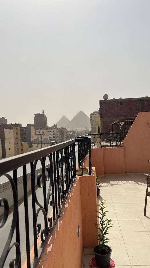 Pyramids Road Guest House Cozy Rooms And Rooftop Breakfast With The Pyramids View Nazlet el-Sîsi Exteriér fotografie
