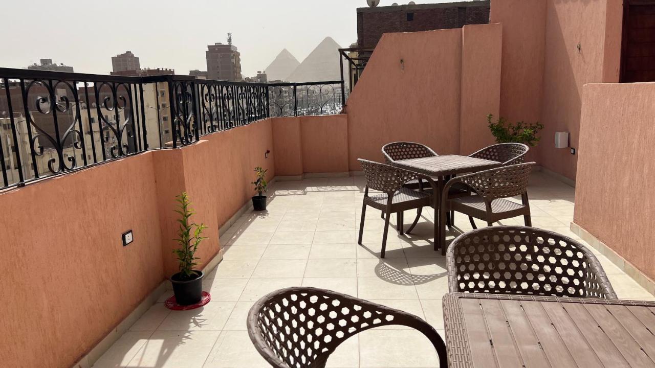 Pyramids Road Guest House Cozy Rooms And Rooftop Breakfast With The Pyramids View Nazlet el-Sîsi Exteriér fotografie